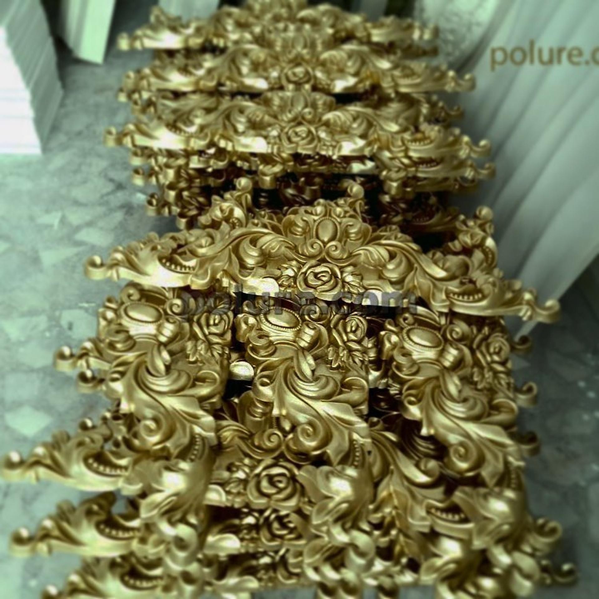 Series of gold-leafed P2833 polyurethane crown models featuring ornate floral motifs and baroque style acanthus leaves.