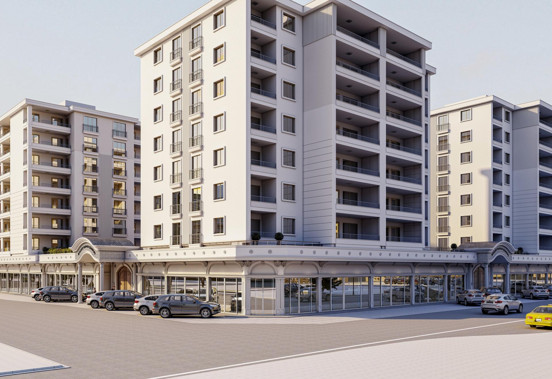 Facciata di edificio commerciale con stipiti in poliuretano Polure, pietre angolari P5240 e corone decorative per finestre.
