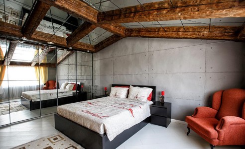 Design Camera da Letto Loft con Travi a Soffitto Rustiche