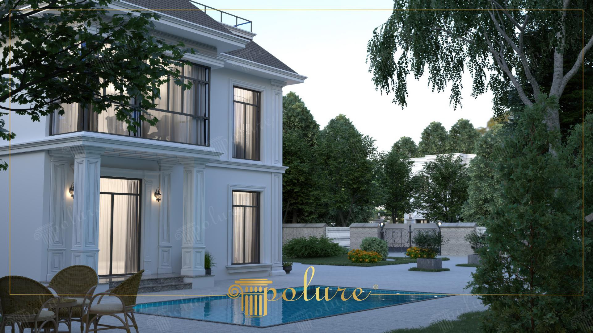 Facciata di villa neoclassica bianca con paraste in poliuretano Polure, cornici per finestre e decori bordo piscina.