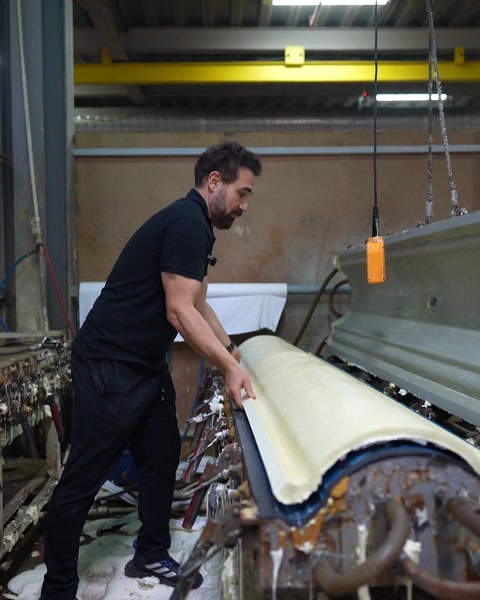 Long patterned cornice peeled from blue silicone negative in one piece