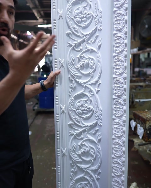 Detail of scrolling stems and leaves straight out of the mould