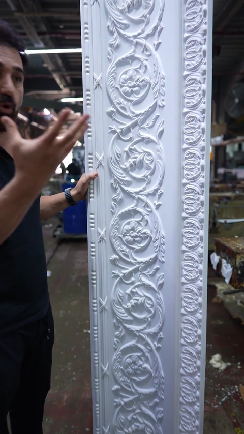 Detail of scrolling stems and leaves straight out of the mould