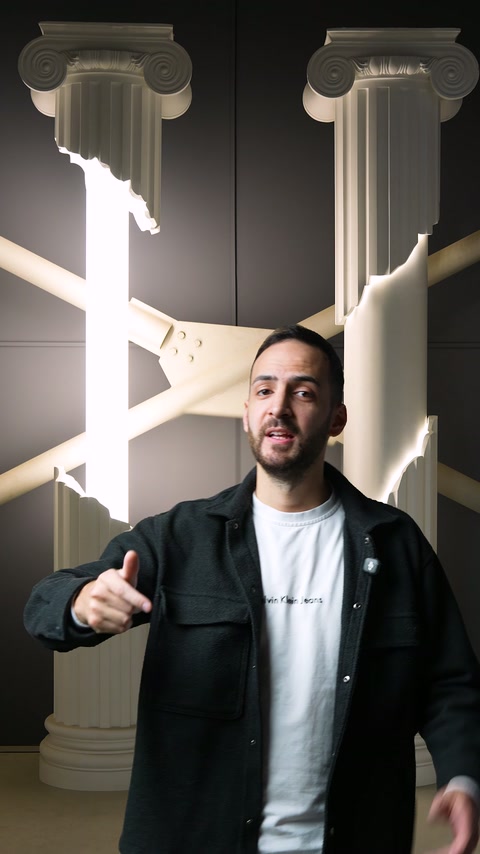 Showroom presenter introduces two columns with plexiglass light strips