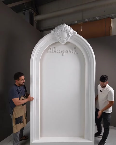 Empty white polyurethane arch niche cast, ready for the dress relief.