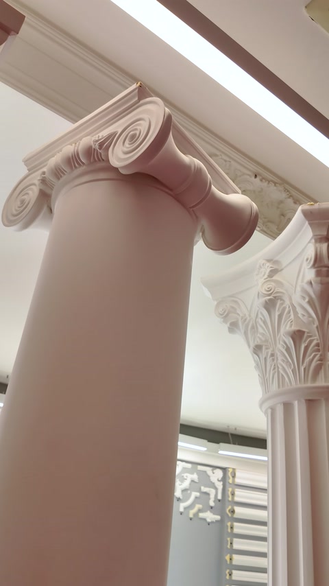 Close-up of an Ionic column capital with scroll volute detail