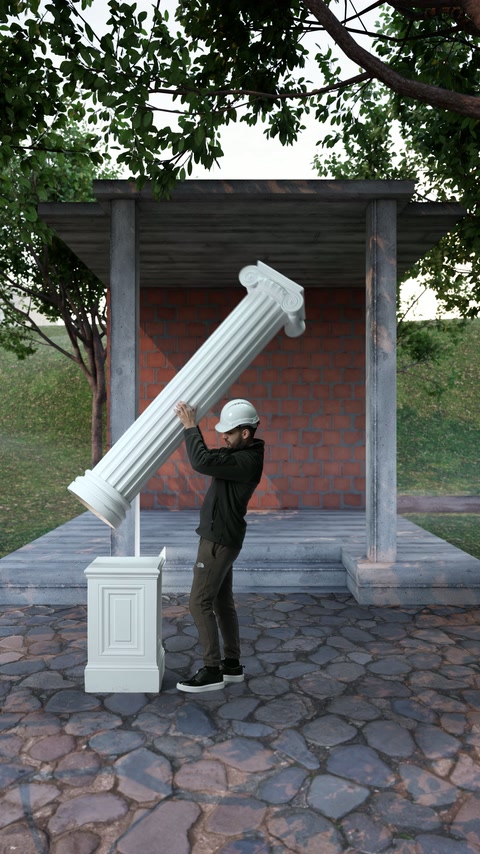 Colonna decorativa viene raddrizzata con controllo per l'installazione sulla base