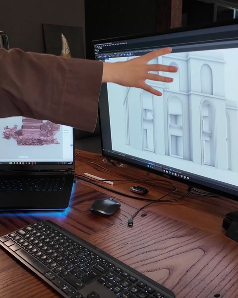 Different sections of arched decorative façade design shown on computer.