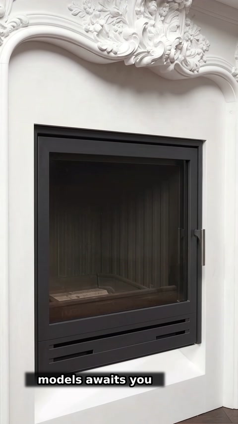 Close view of the firebox framed by a white decorative surround