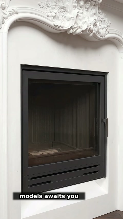 A closer view shows the black firebox within the white arched surround.