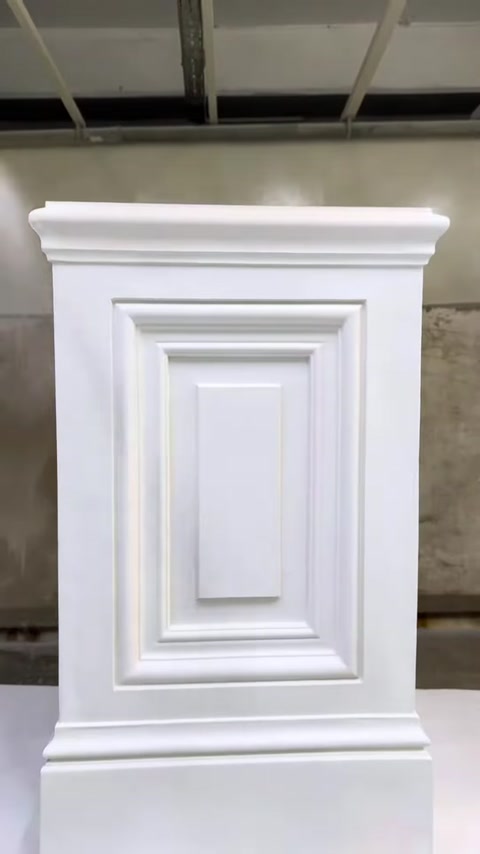 The completed product features symmetrical frame and moulding details