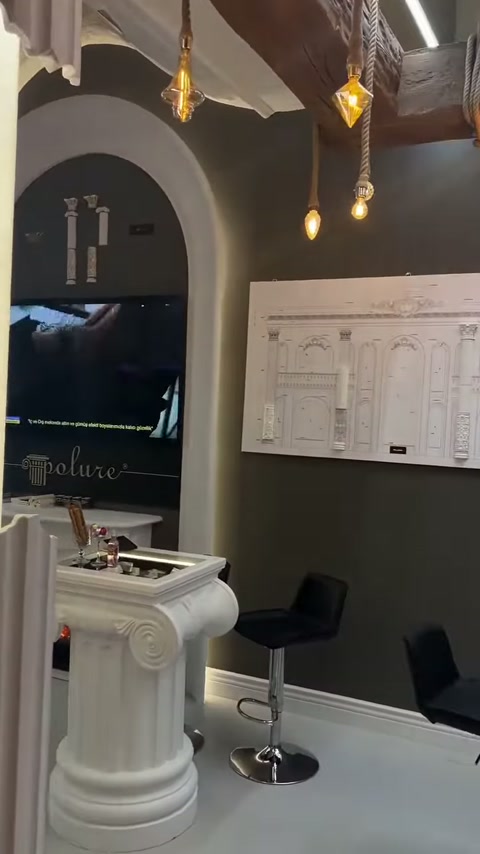 Fair stand features door surround drawings, fluted base and arched niche