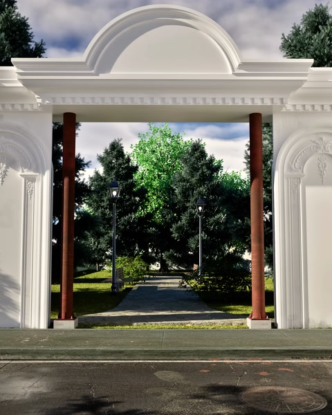 Porta d'ingresso ad arco in poliuretano completata con dettaglio di coronamento su vialetto giardino