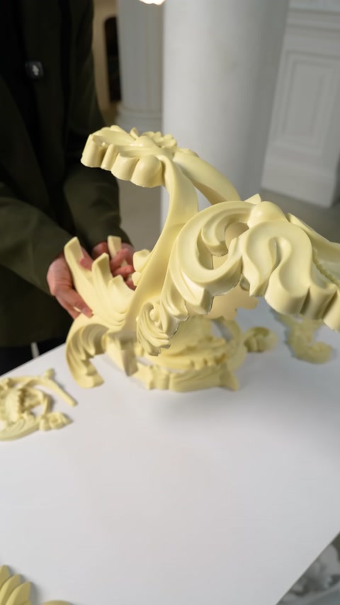 A relief ornamental piece is bent to introduce its flexible structure