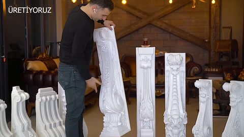 Long white column positioned vertically among different models