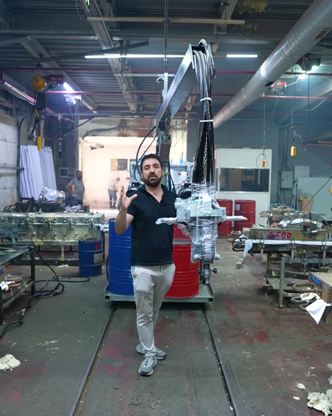 Wide-angle view of the Hennecke mixing machine installation on the factory line
