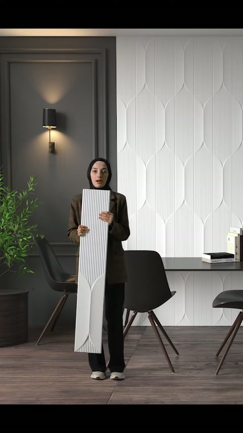 L'esempio di pannello scanalato viene presentato insieme alla decorazione murale geometrica completata.