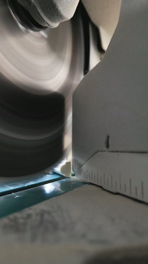 Rotating CNC tool refines the curved edge of a profile