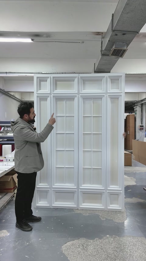 Assembled decorative wall panel displays upper rectangles and window-style grids