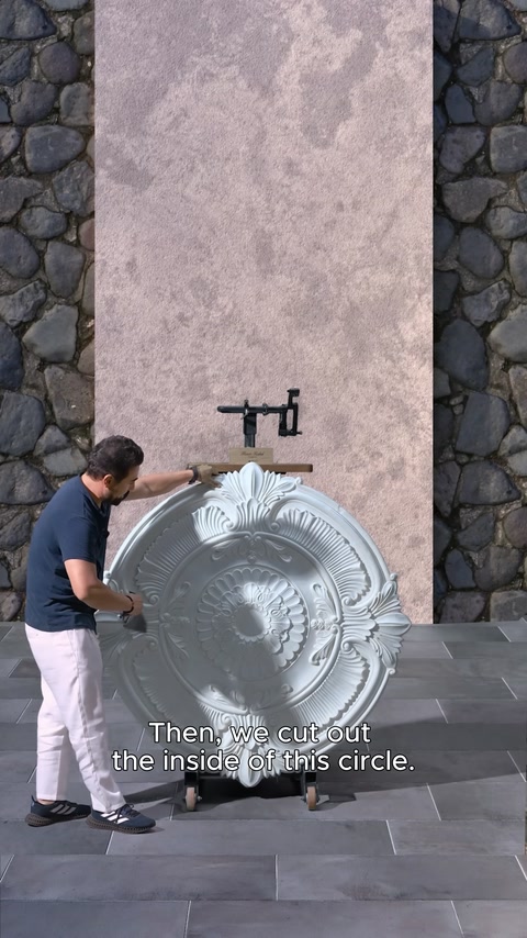 Inner part of medallion is removed to create two arch pieces