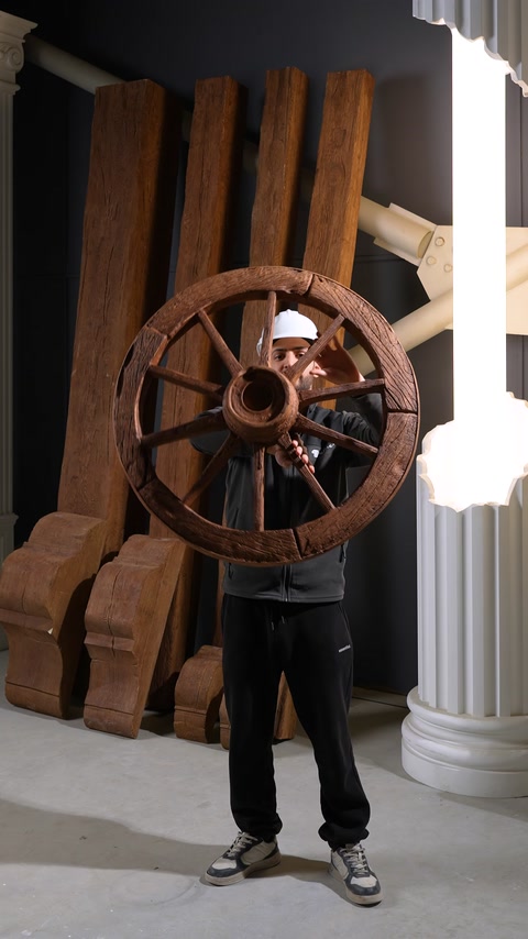 Decorative polyurethane wheel features rustic spokes and realistic wood detailing