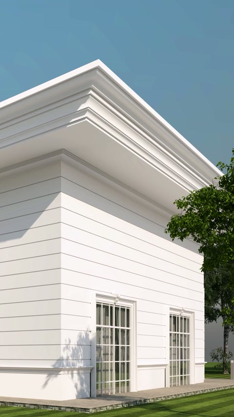 White villa corner finished with layered cornices and horizontal mouldings