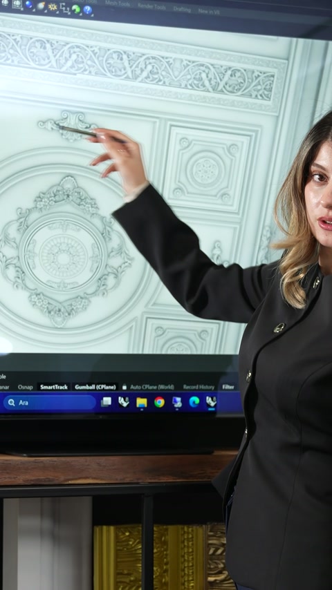 Digital ornamental ceiling design is reviewed before production preparation