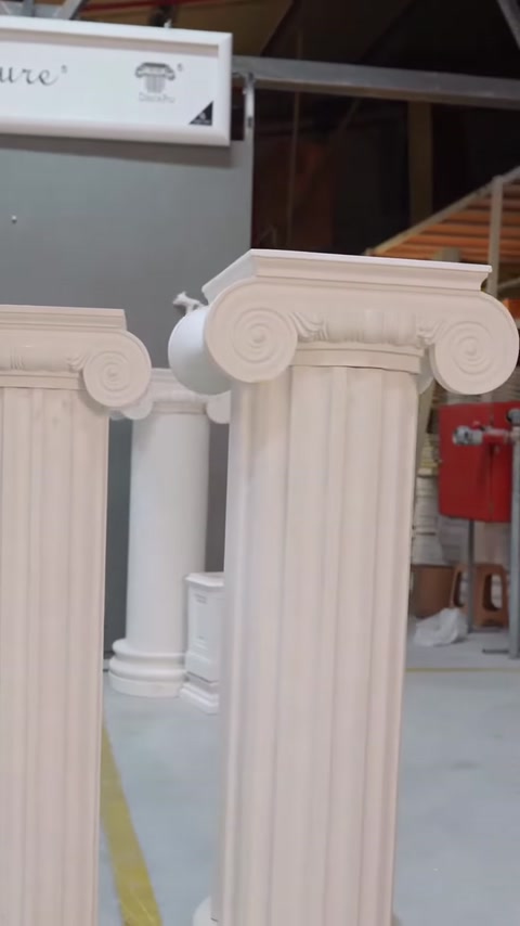 Three different column capitals and fluted shafts displayed side by side