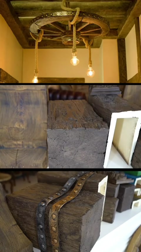 Travi rustiche applicate al soffitto sono mostrate insieme a lampadine sospese