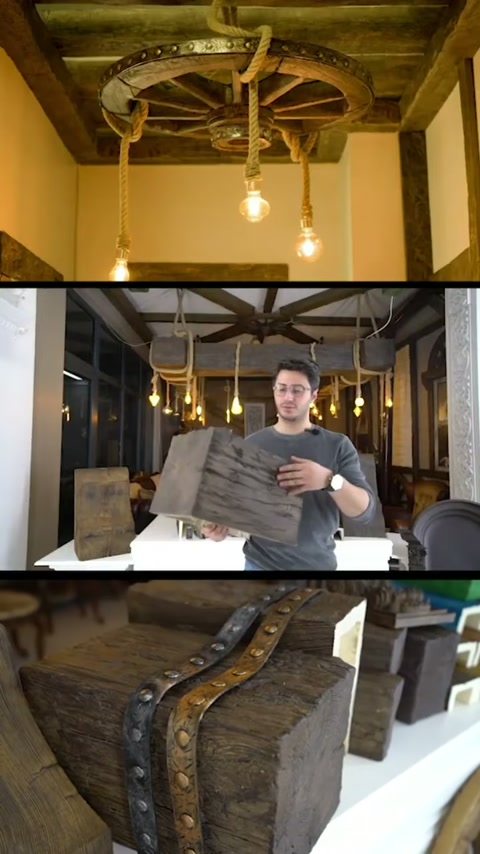 Nel soffitto si visualizzano illuminazioni a forma di ruota e pannelli con texture legno