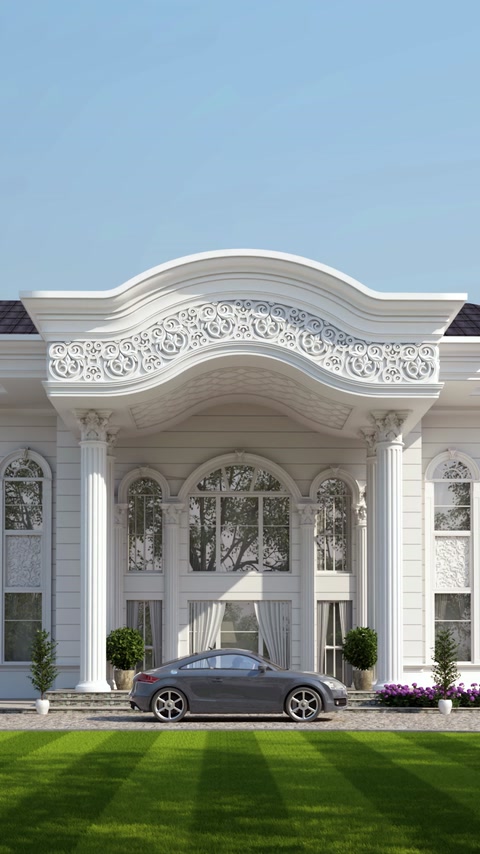 Villa entrance facade with ornate polyurethane pediment and columns.