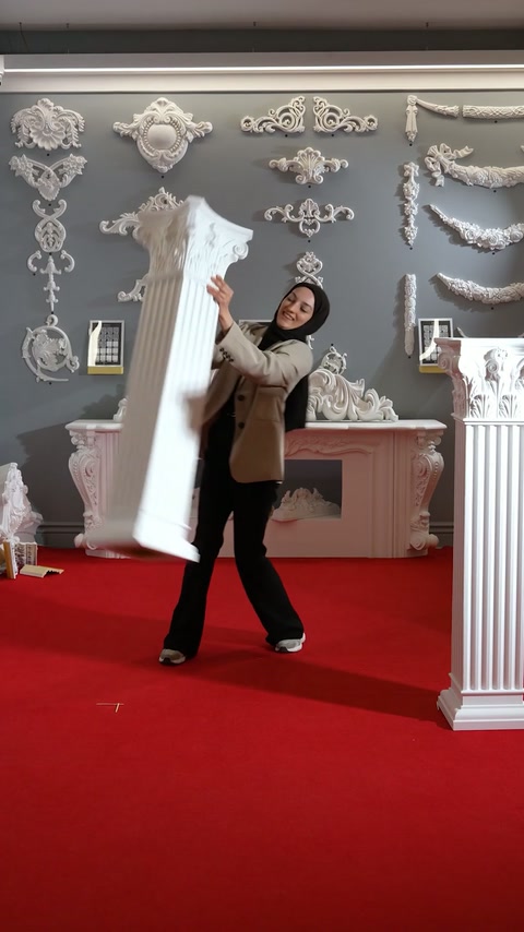 A fluted polyurethane pedestal body is displayed before final arrangement.