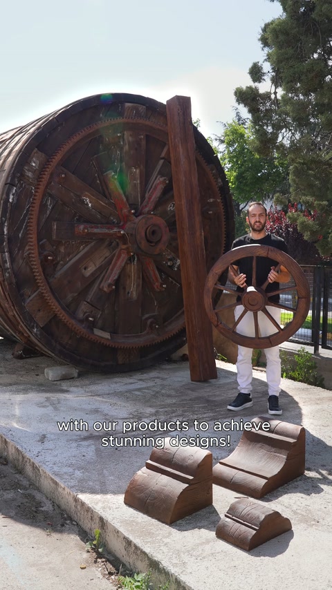 A small wooden wheel is introduced alongside the large round structure