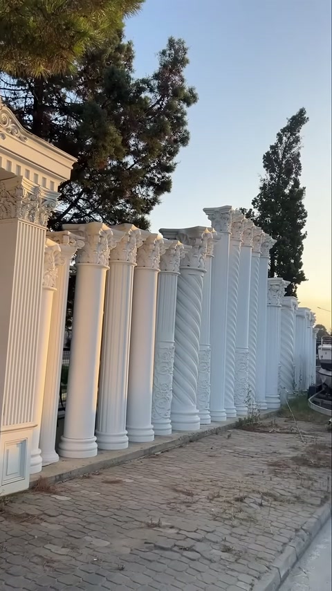 Column row in open space showing twisted and straight designs together