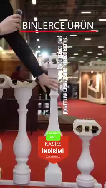 A white decorative handrail and railing element are introduced in close-up