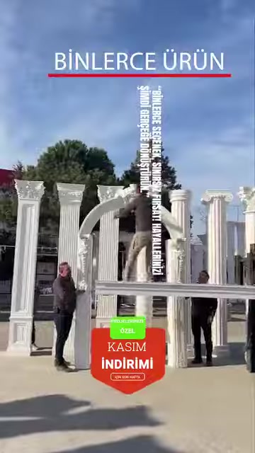 A decorative structure created with columns is shown outdoors