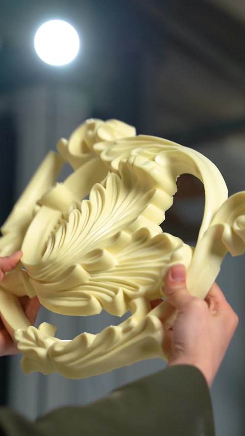 Detailed acanthus scroll molding piece shown from front