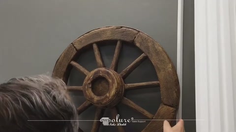 Comparing decorative wheel models in different colors on the fireplace