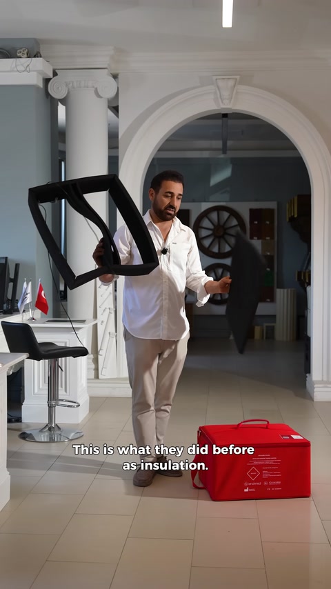 Existing black insulation pieces are compared beside the bag