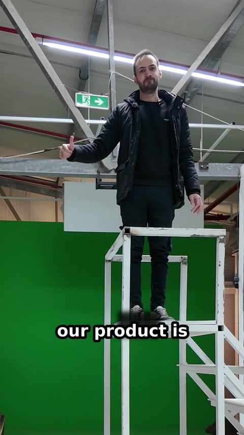 Presenter gestures from the platform after completing the impact drop