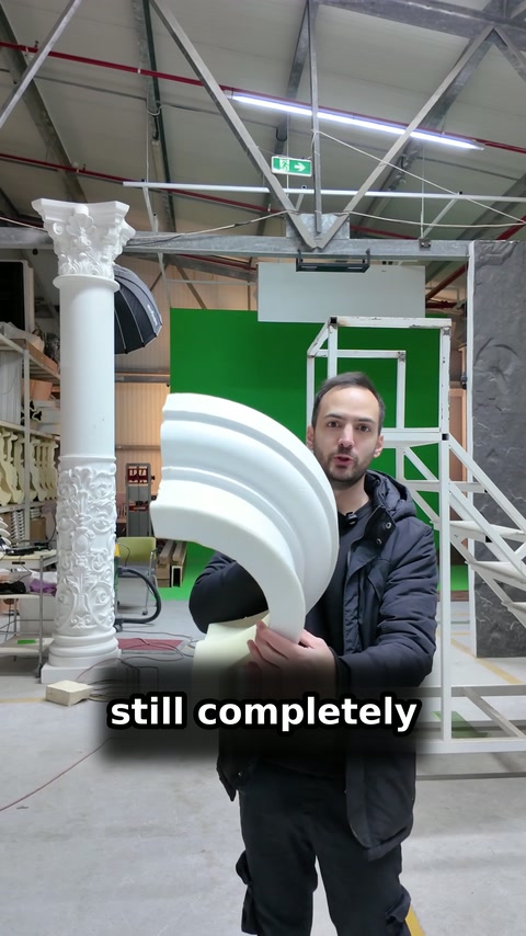 Large curved polyurethane profile is shown intact beside a decorative column