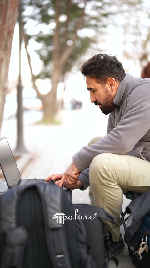 Team member checking computer settings during measurement operations