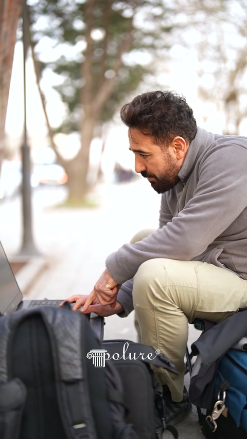 Technical operator working on computer next to scanning equipment
