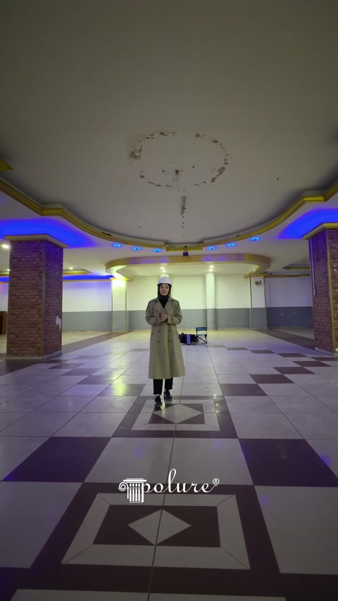 Empty hall space with colored ceiling lighting fixtures