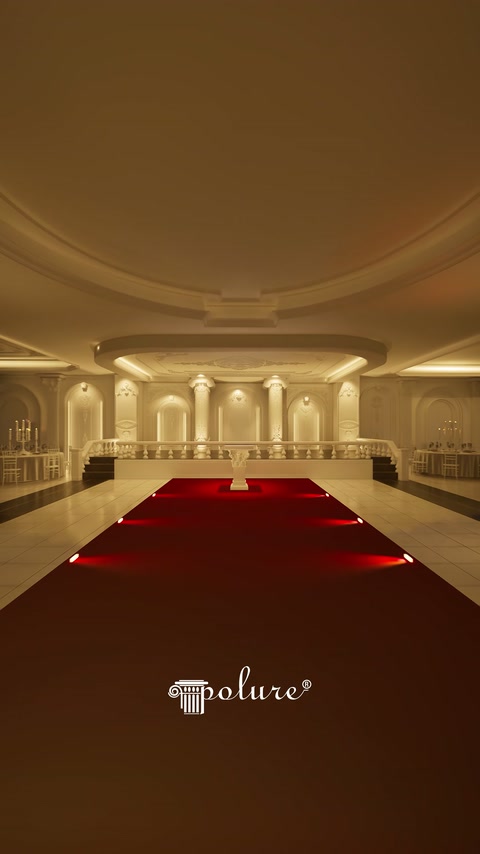 Wide hall design showcasing arches, columns, and red carpet as focal points