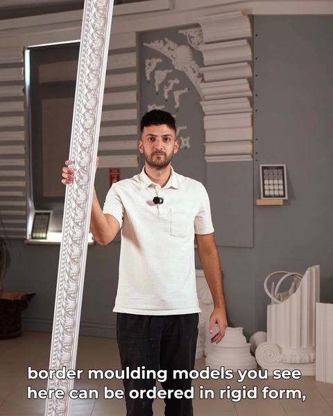 Ornate border is held vertically for a clear pattern view