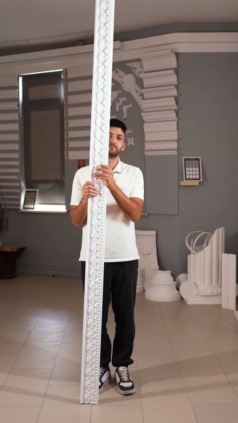 Straight border moulding length is displayed against the showroom backdrop