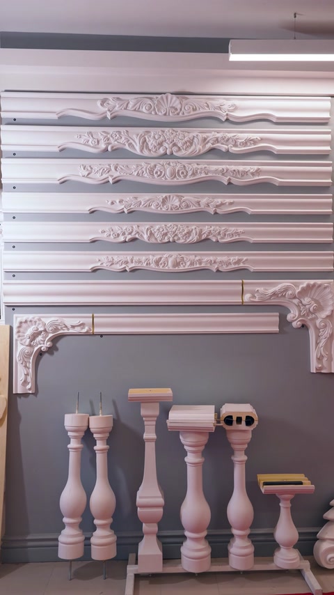 Display board presents layered border moulding designs for comparison