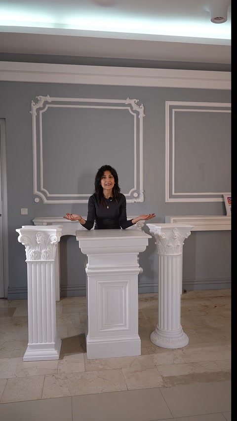 Front view shows square pedestal flanked by two short columns.