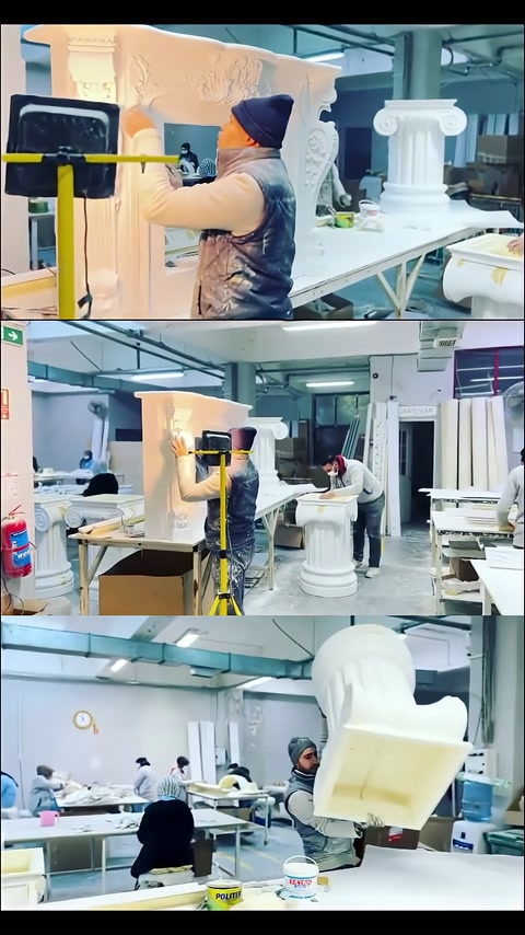 Artigiano che applica la finitura superficiale al corpo del tavolo con design a colonna